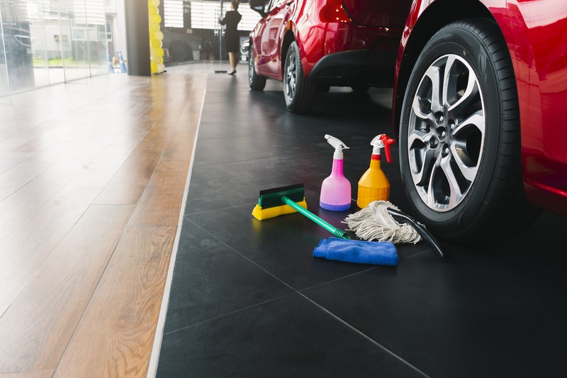 cleaning company getting ready for a clean floor in an auto car dealership showroom in chandler az