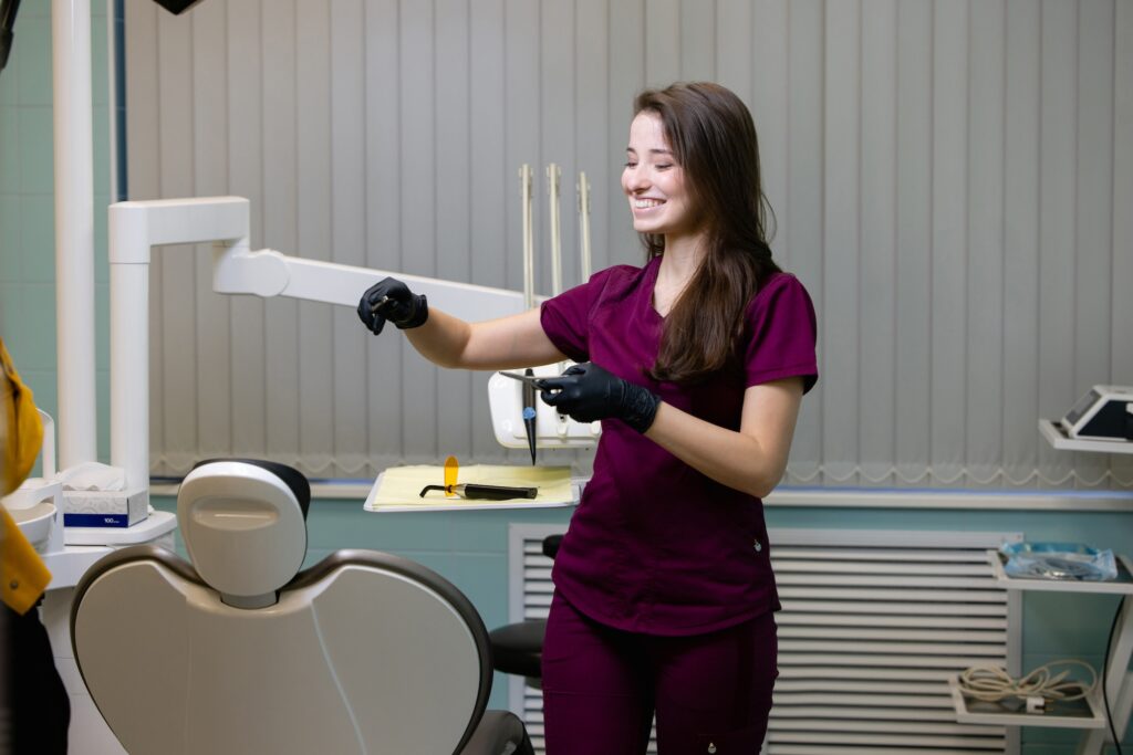 woman from a cleaning company cleaning a dental office with dentists in gilbert az, Dental Office Cleaning,