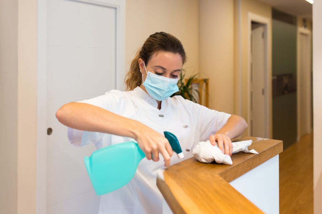 female office cleaner cleaning an medical office in gilbert az