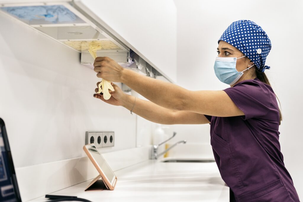 photo of woman in scottsdale from a cleaning company getting read to clean a veterinarian office in gilbert az