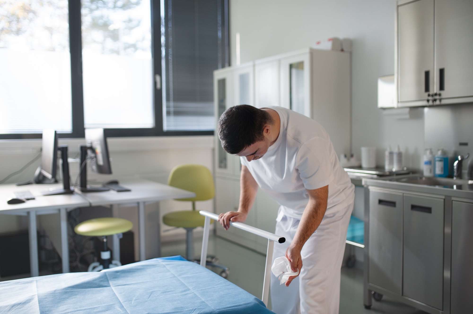 man from a cleaning company cleaning a medical office in phoenix arizona area